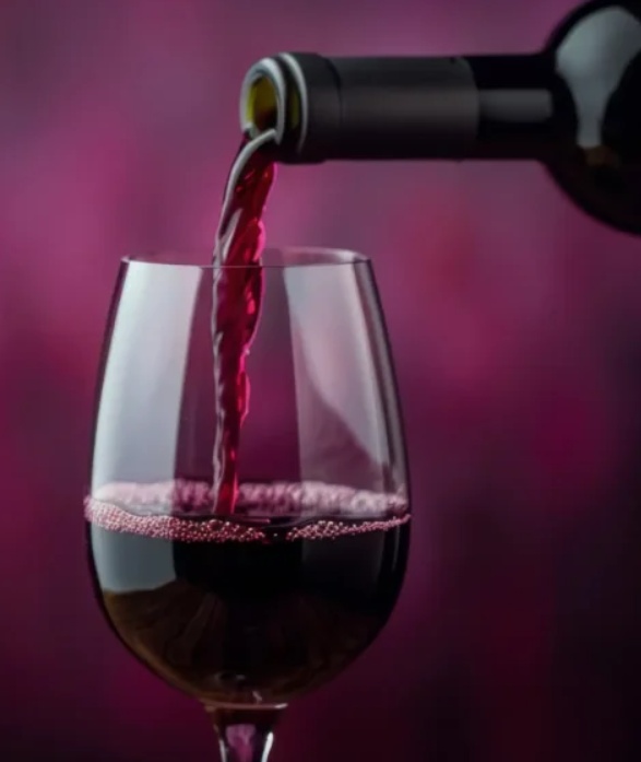 Build-a-Bottle event with wine bottles and guests
