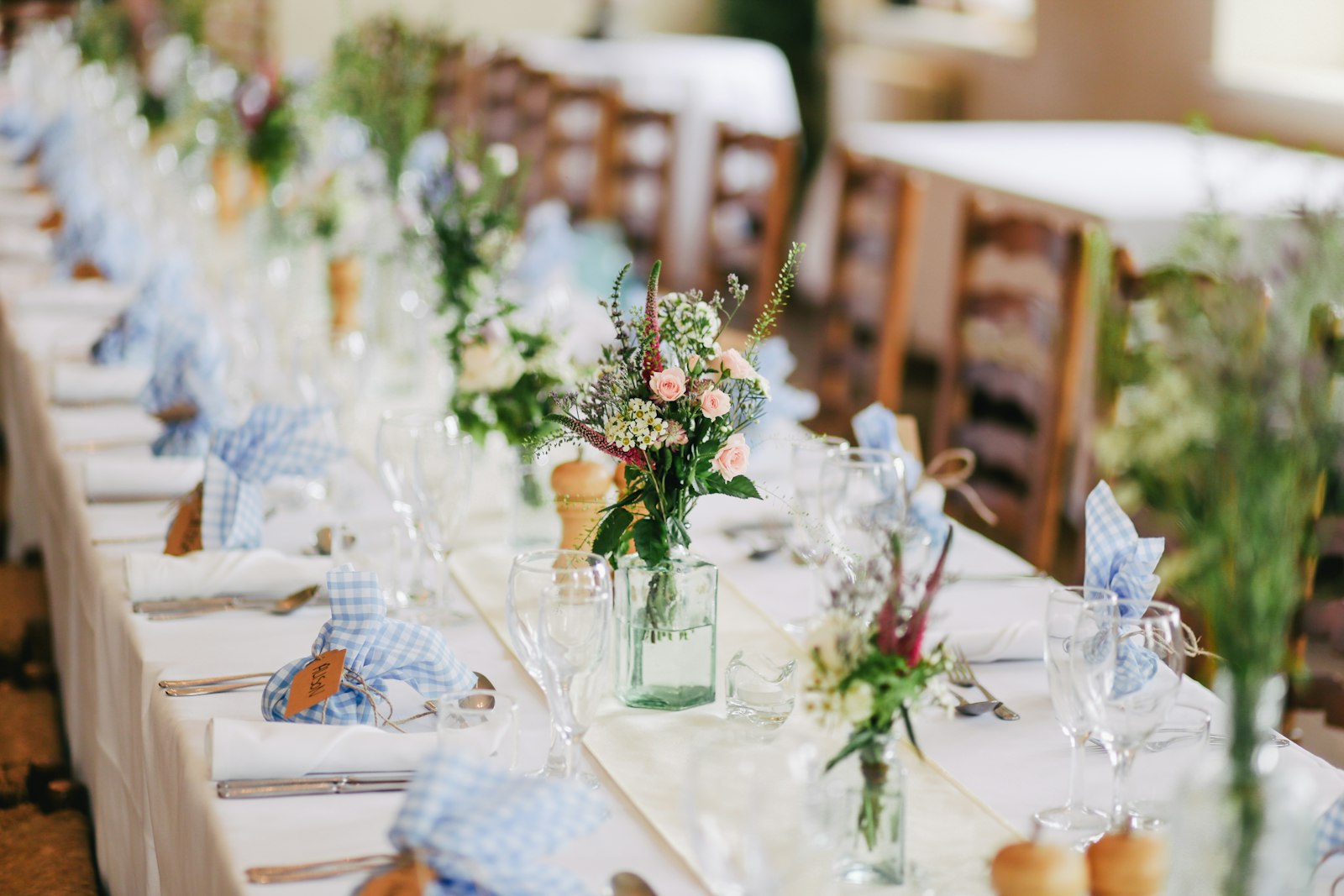 Wine bottle with custom label on a table setting at a housewarming