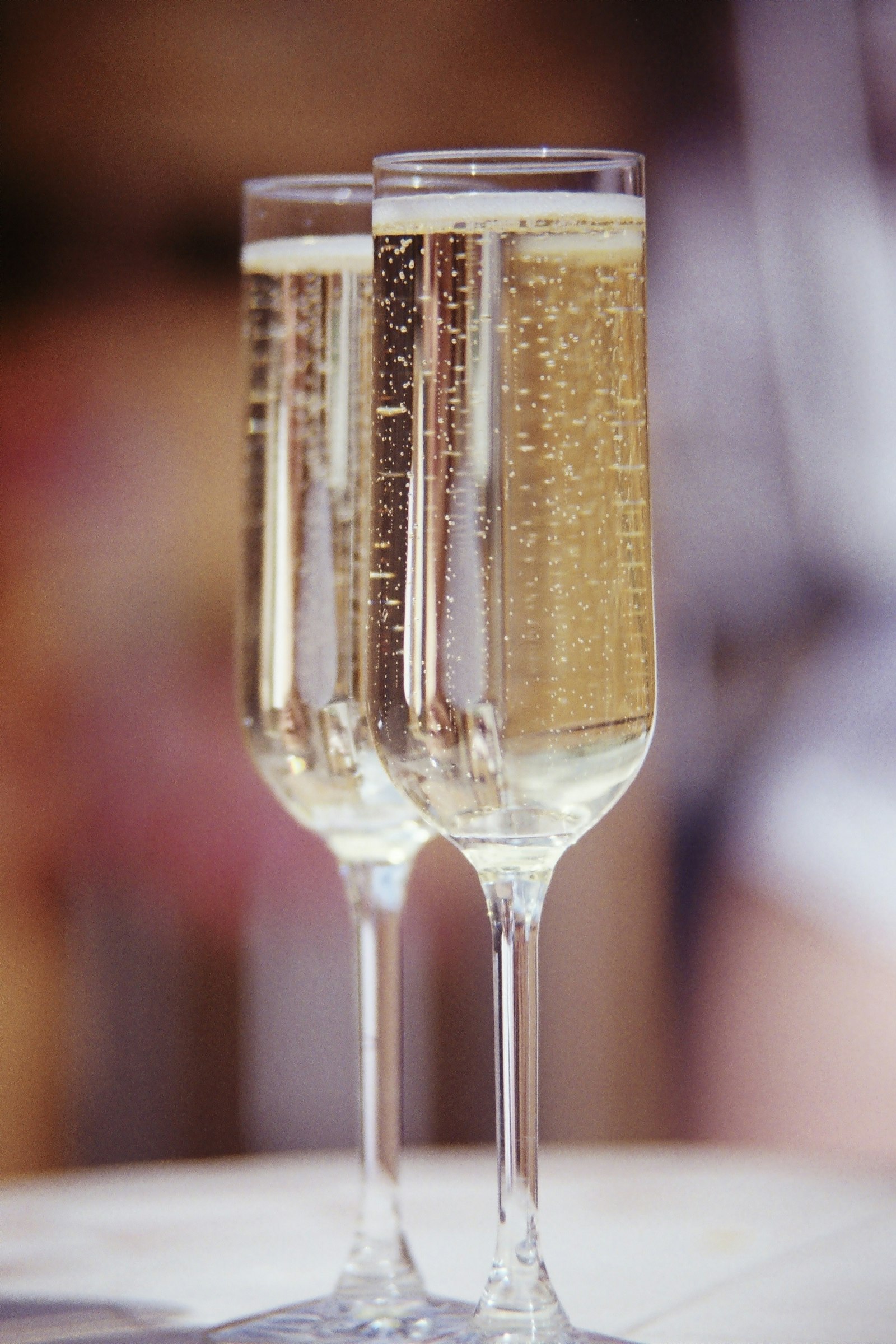 A glass of wine ready for a celebration toast